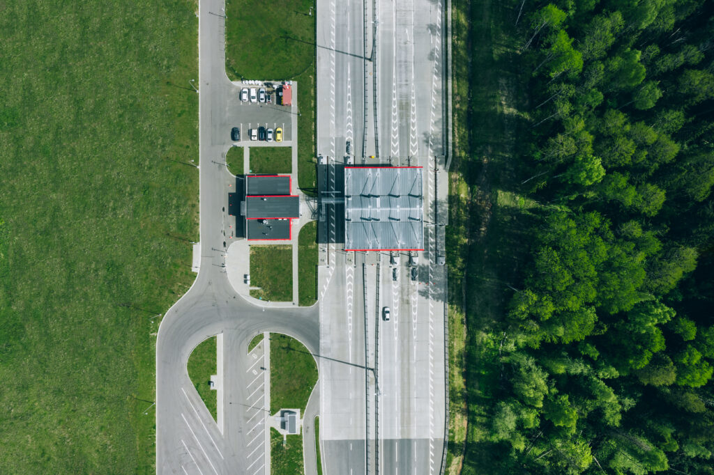 Aerial drone view on toll collection point. Aerial view gate for expressway fee payment