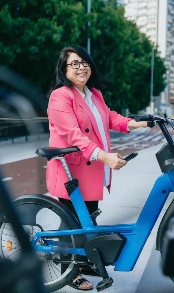 Businesswoman renting a E bike