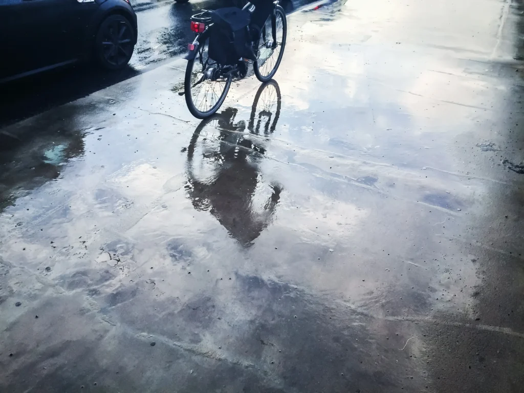 Biking through rainy streets