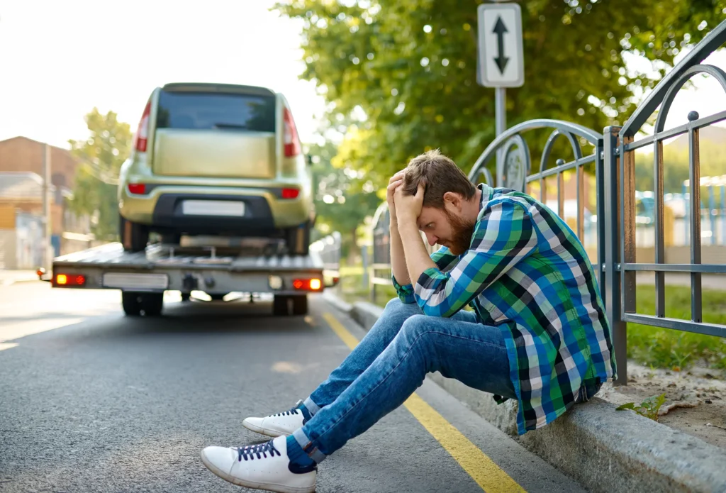 Unhappy man's car is towed