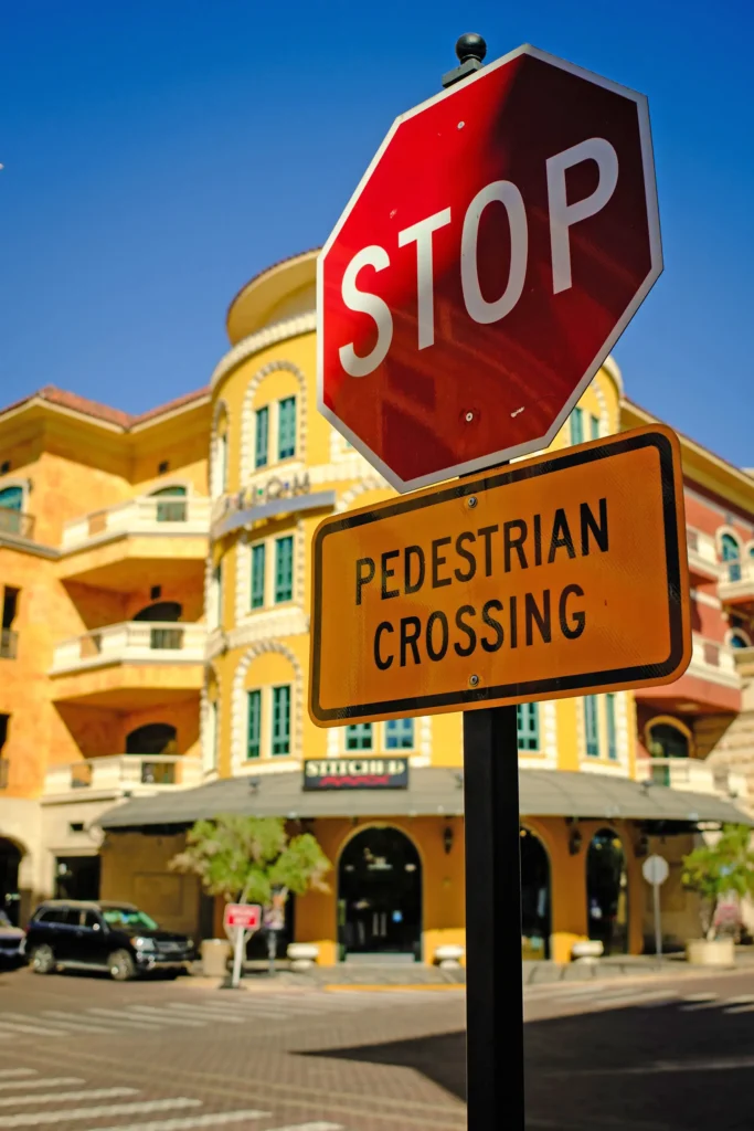 urban street scene with stop sign