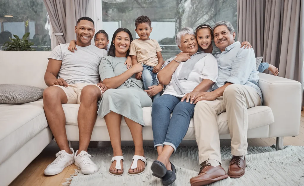 Large family sitting together on couch