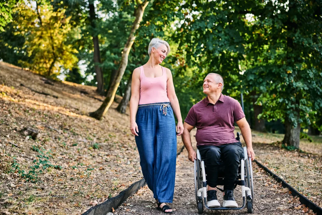 joyful walk in nature with wheelchair